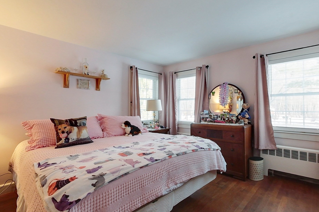 19 Mill Road Littleton, MA 01460 - Photo 14 of 31 a bedroom with a large bed and a window