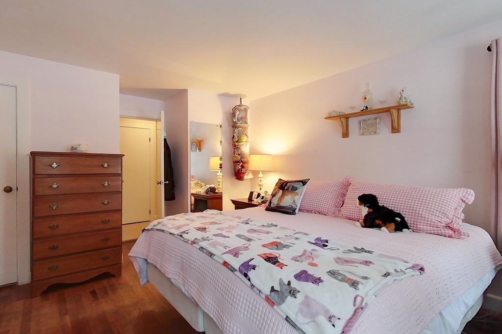19 Mill Road Littleton, MA 01460 - Photo 15 of 31 a bedroom with a bed and a dresser