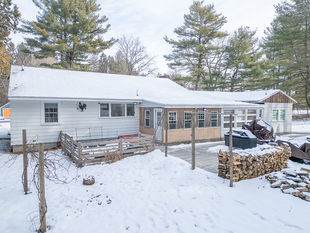 19 Mill Road Littleton, MA 01460 - Photo 26 of 31 a view of a house with large windows