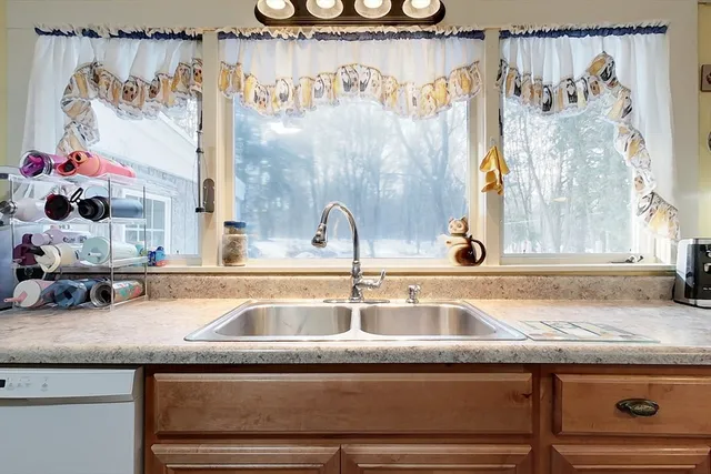 a view with a sink and a mirror