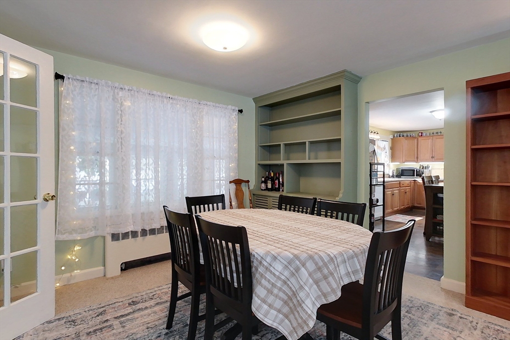 19 Mill Road Littleton, MA 01460 - Photo 8 of 31 a view of a dining room with furniture and a window