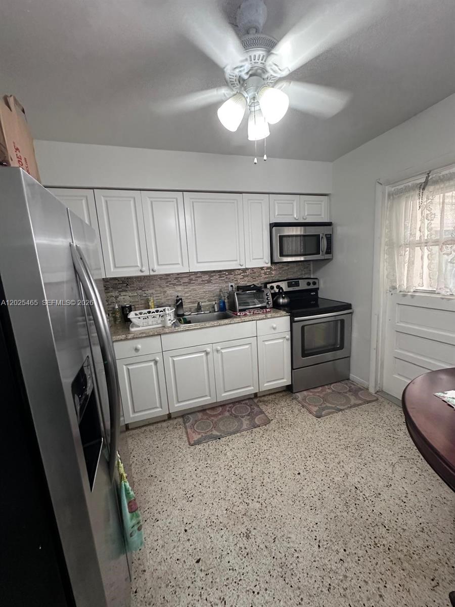 11016 Southwest 7th Street Miami, FL 33174 - Photo 16 of 21 REAR KITCHEN