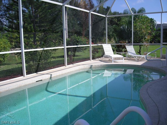 9245 Lanthorn Way Estero, FL 33928 - Photo 1 of 6 a view of a deck with a yard