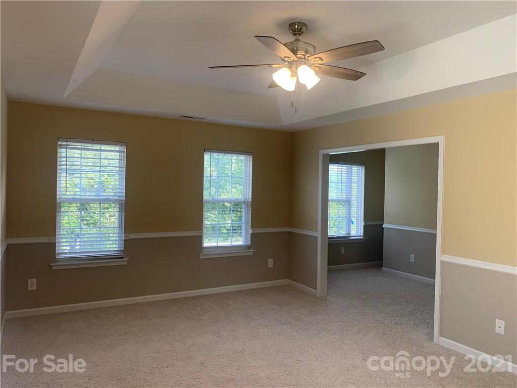136 Royalton Road Mooresville, NC 28115 - Photo 12 of 28 a view of an empty room with a window