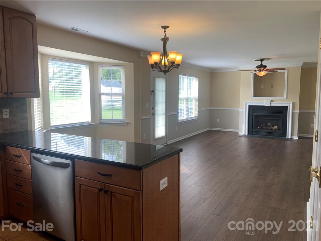 136 Royalton Road Mooresville, NC 28115 - Photo 2 of 28 a view of livingroom with furniture window and wooden floor