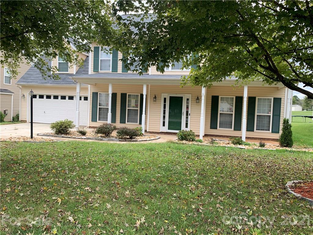136 Royalton Road Mooresville, NC 28115 - Photo 4 of 28 front view of a house with a yard