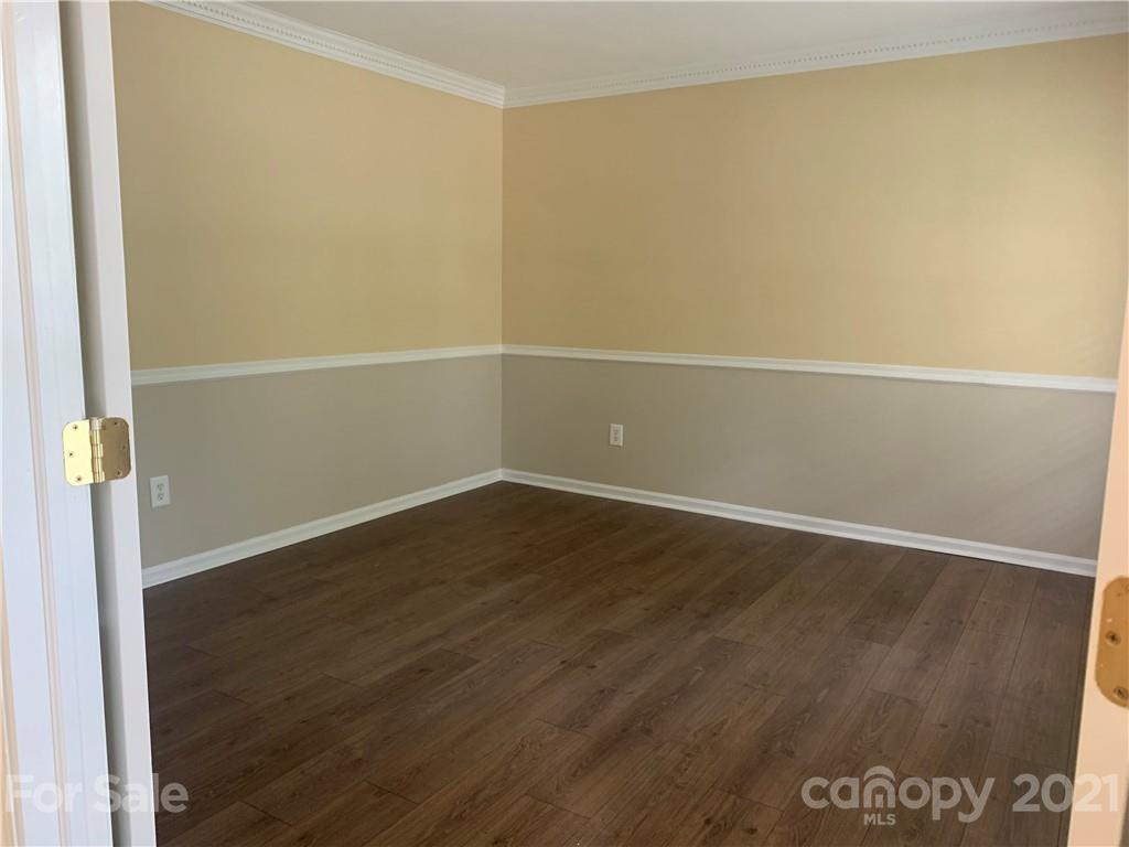 136 Royalton Road Mooresville, NC 28115 - Photo 7 of 28 a view of a room with wooden floor
