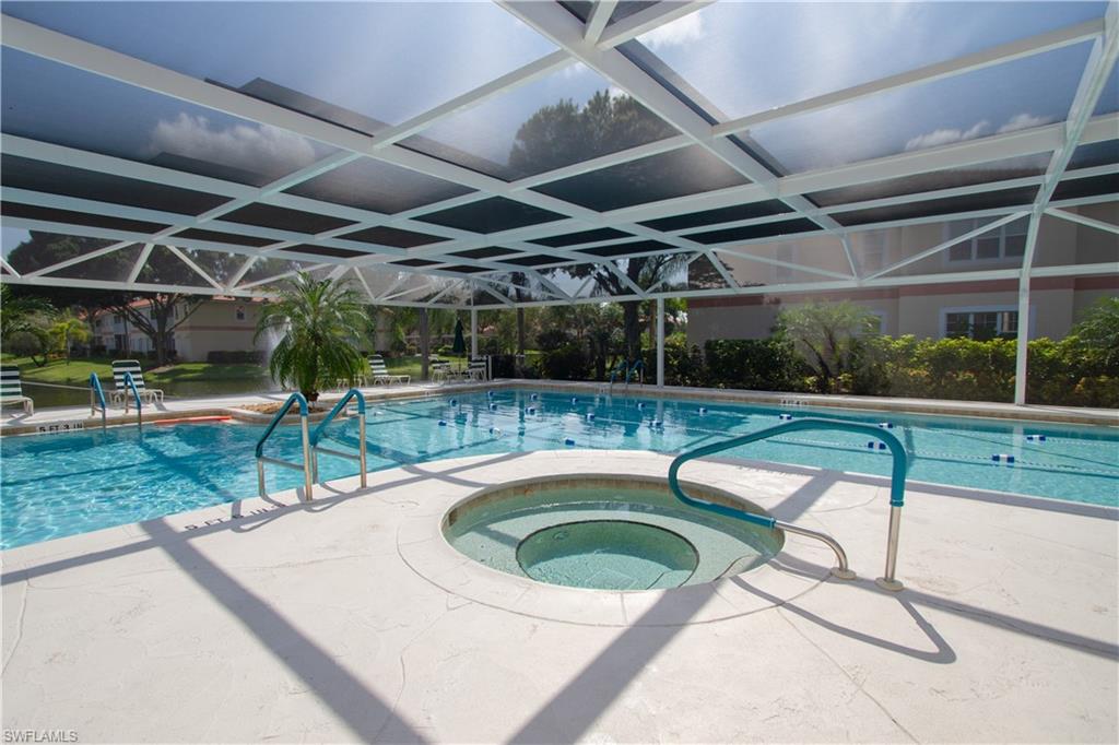 7648 Oleander Gate Drive, Unit 202 Naples, FL 34109 - Photo 19 of 23 a outdoor view with a sitting space