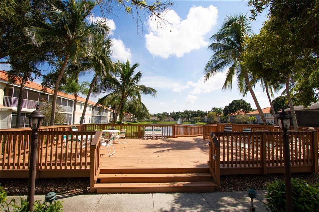 7648 Oleander Gate Drive, Unit 202 Naples, FL 34109 - Photo 22 of 23 a view of outdoor space with deck having patio