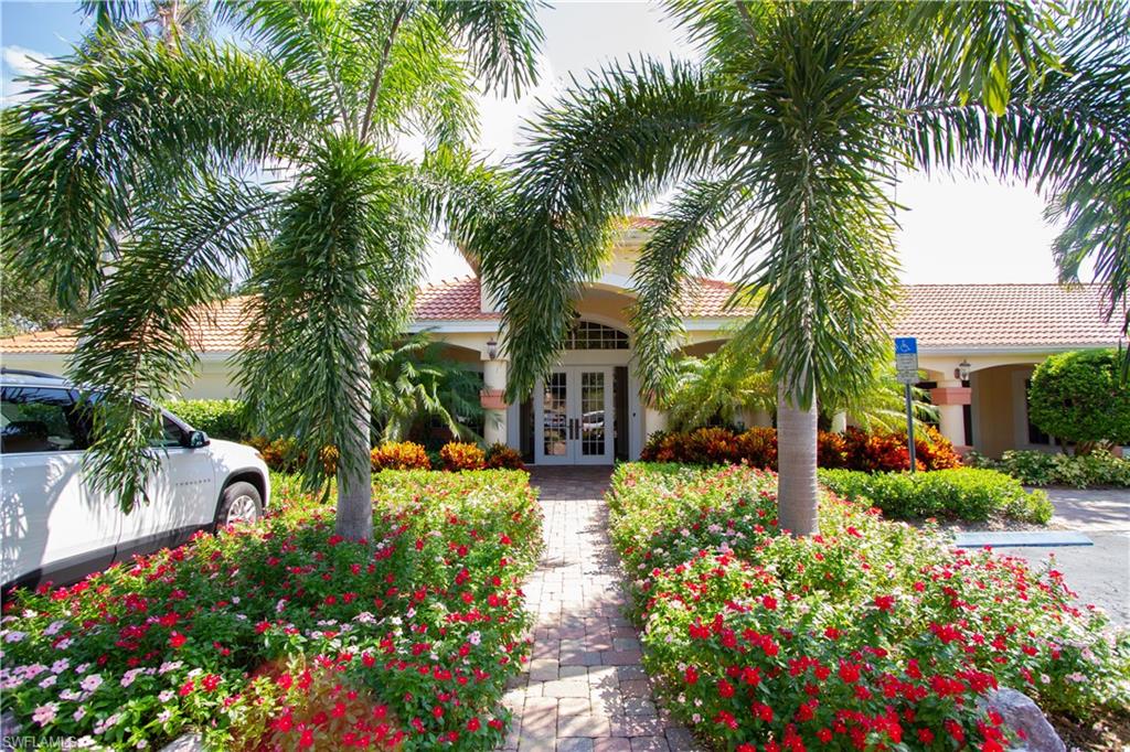 7648 Oleander Gate Drive, Unit 202 Naples, FL 34109 - Photo 23 of 23 a view of a garden with plants