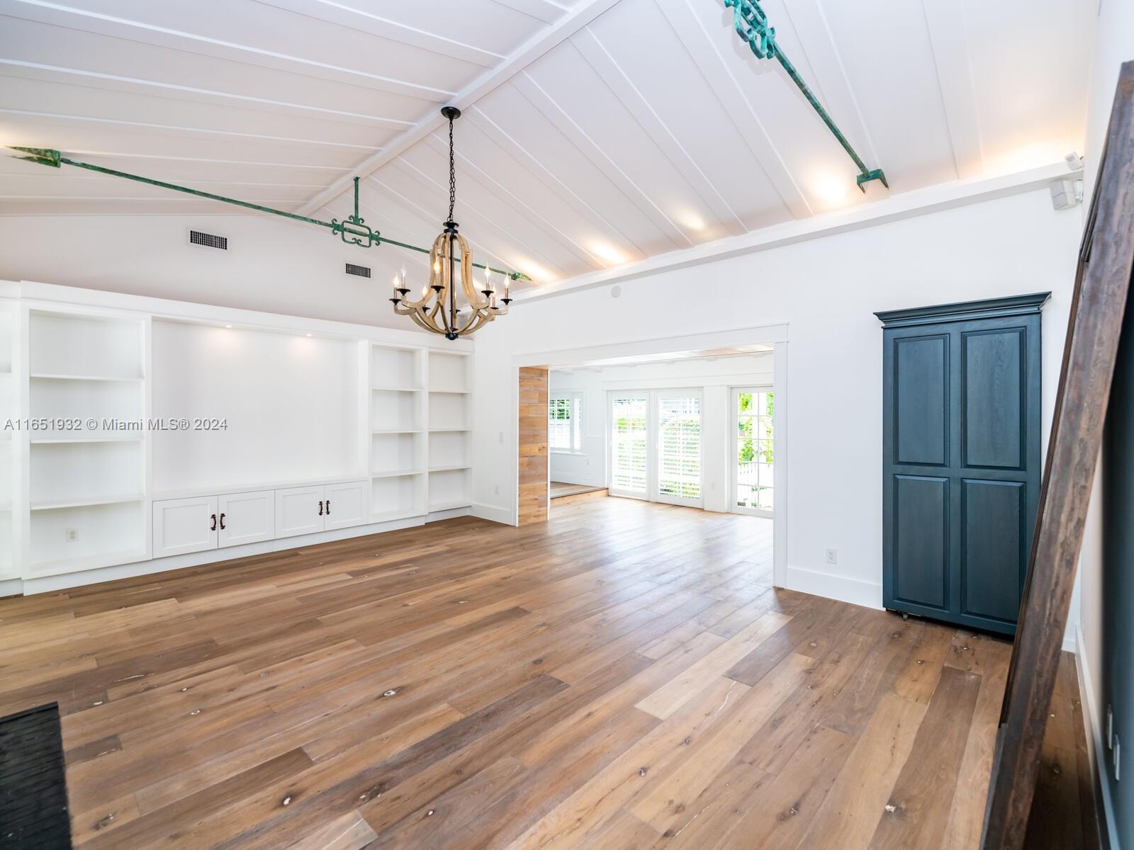 4700 Lake Road Miami, FL 33137 - Photo 24 of 92 a view of a room with wooden floor and window