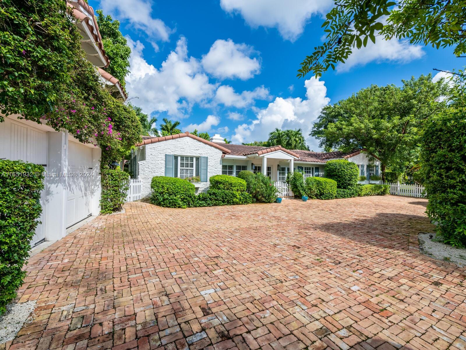 4700 Lake Road Miami, FL 33137 - Photo 5 of 92 a house with trees in the background