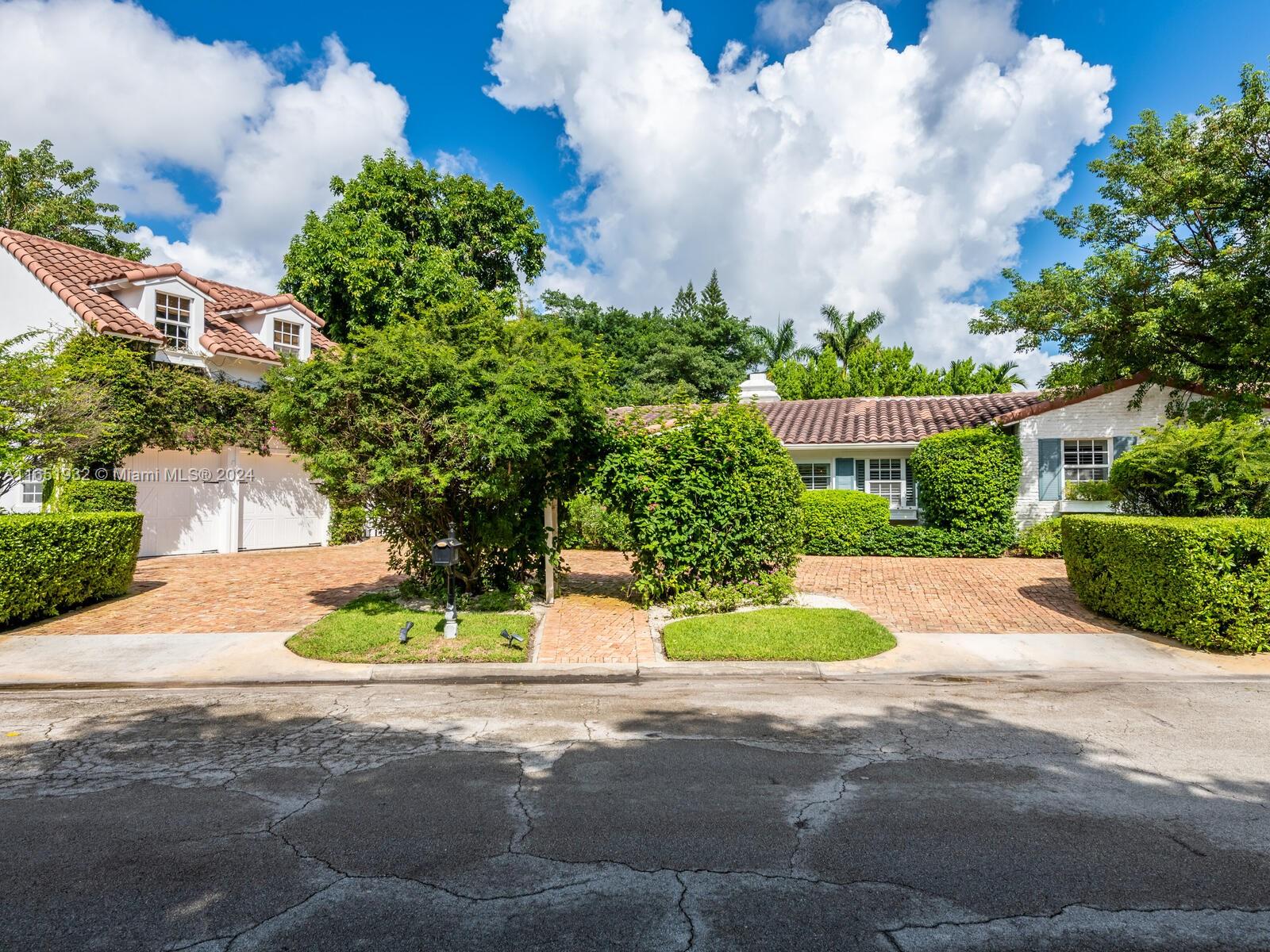4700 Lake Road Miami, FL 33137 - Photo 6 of 92 a view of a fountain in front of a house