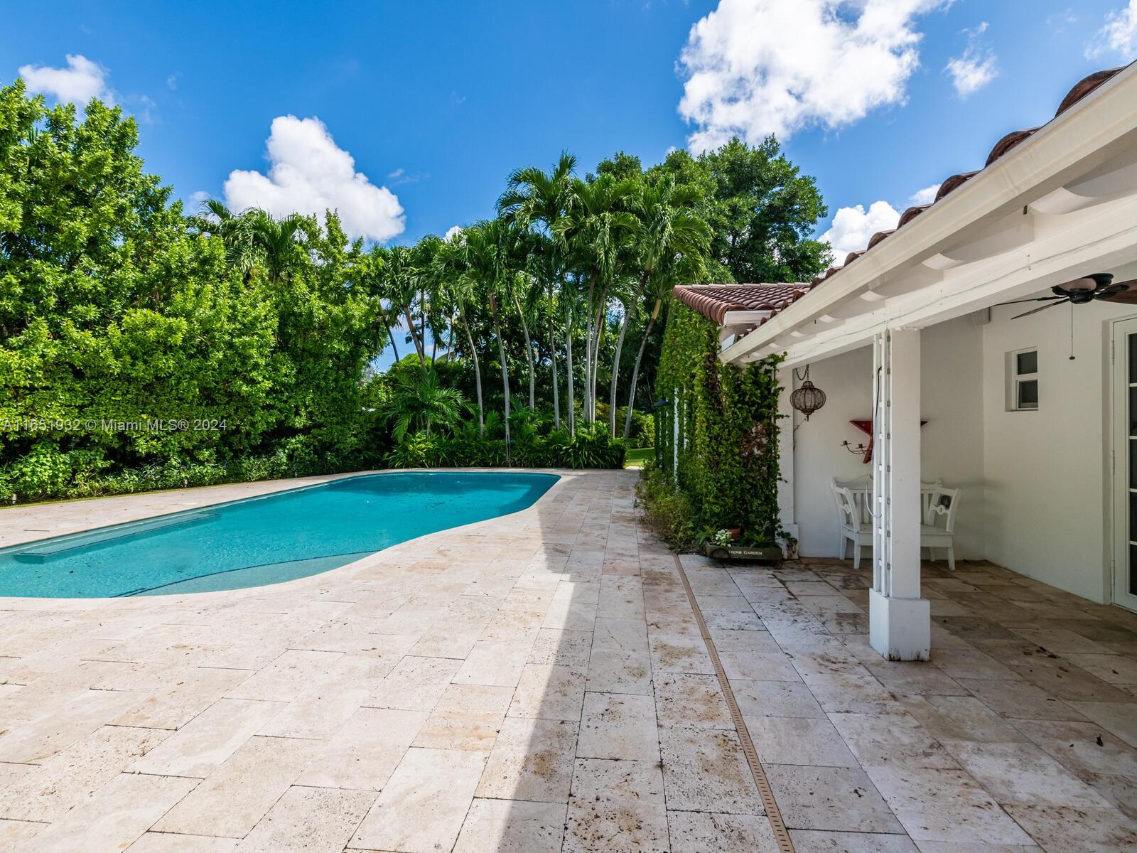 4700 Lake Road Miami, FL 33137 - Photo 64 of 92 a view of a back yard with potted plants