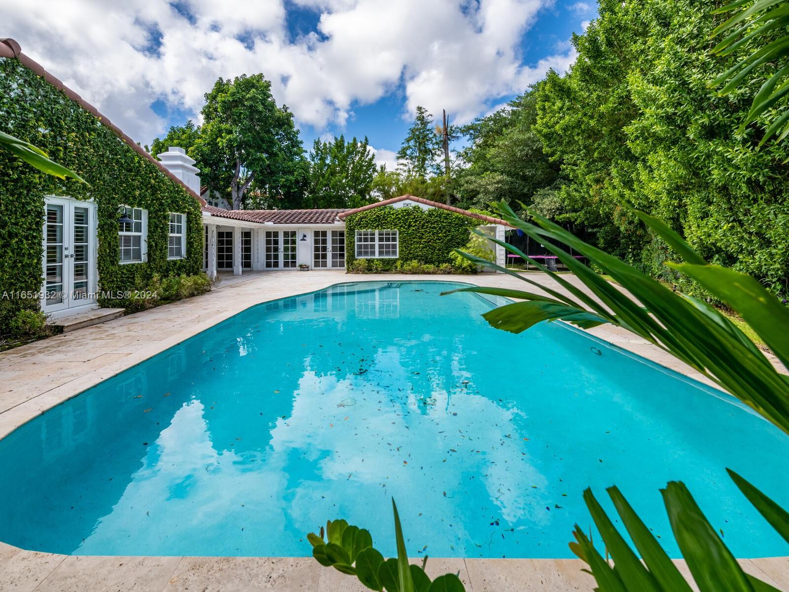 4700 Lake Road Miami, FL 33137 - Photo 81 of 92 a view of a house with a yard