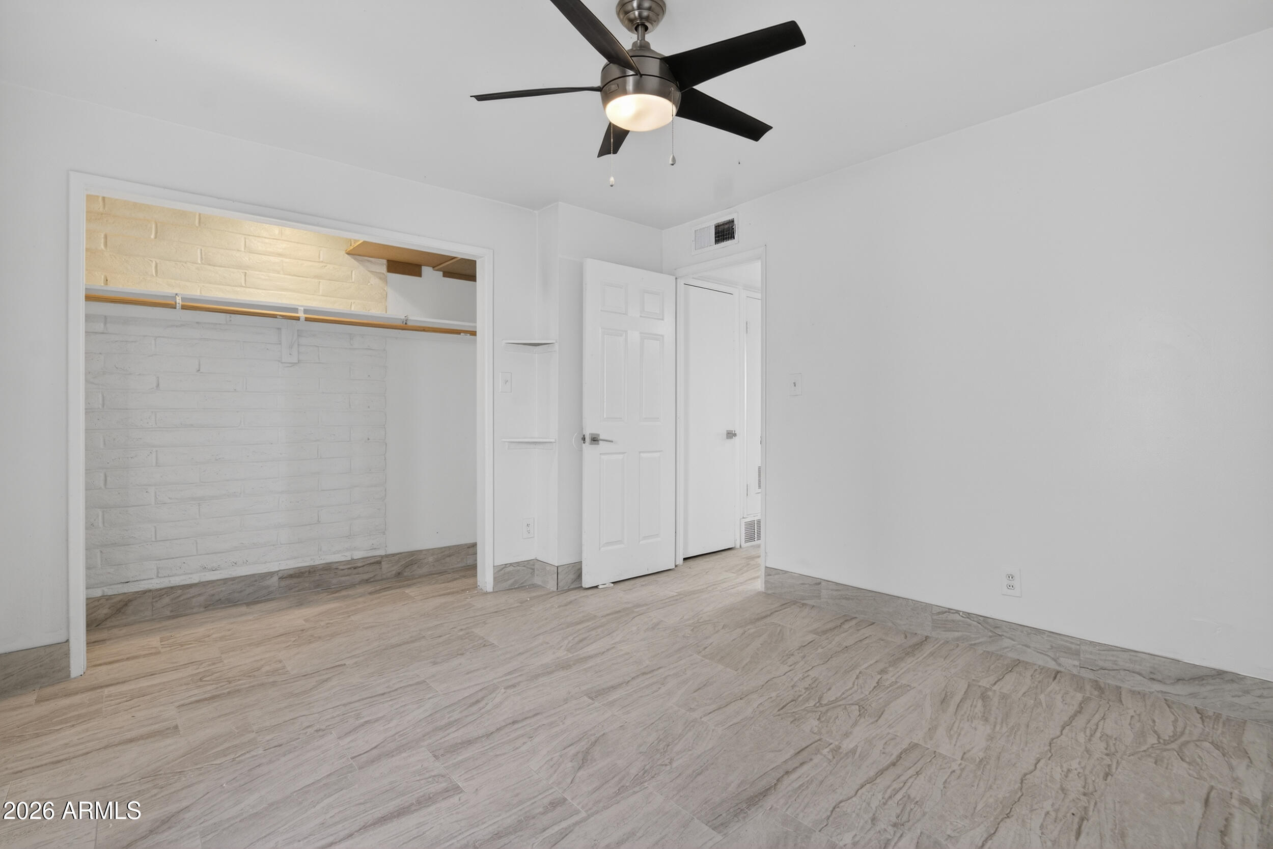 2925 North 38th Street, Unit 2 Phoenix, AZ 85018 - Photo 13 of 19 wooden floor in an empty room