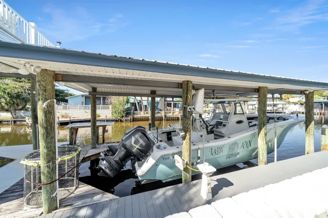 a view of a swimming pool with lounge chair