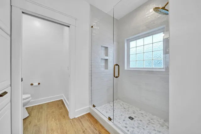 a bathroom with a toilet and a sink