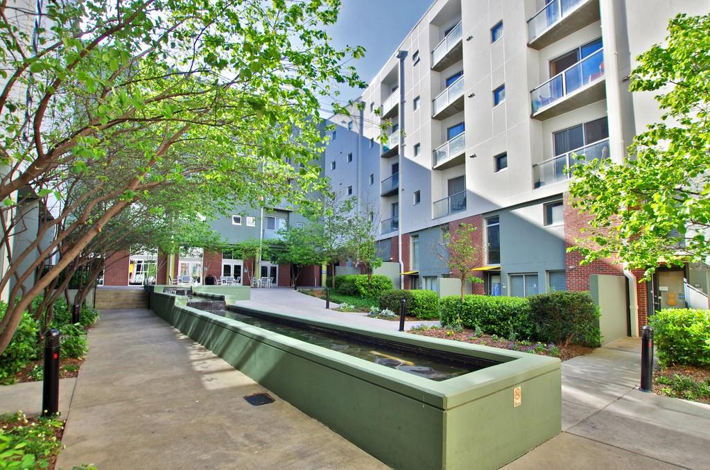 620 Glen Iris Drive Northeast, Unit 207 Atlanta, GA 30308 - Photo 1 of 1 a view of building with yard