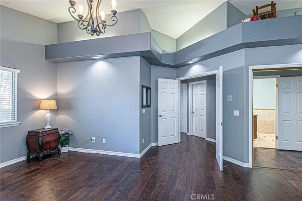 a view of a livingroom with wooden floor