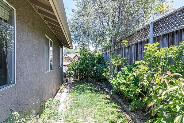 a backyard of a house with lots of green space