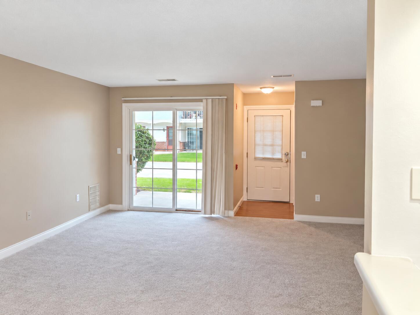 596 Pewaukee Road, Unit C Pewaukee, WI 53072 - Photo 10 of 25 Living Room