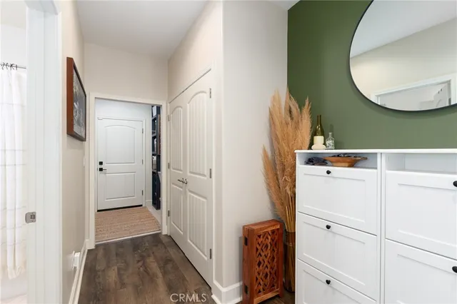 a bathroom with a sink a toilet and shower curtain