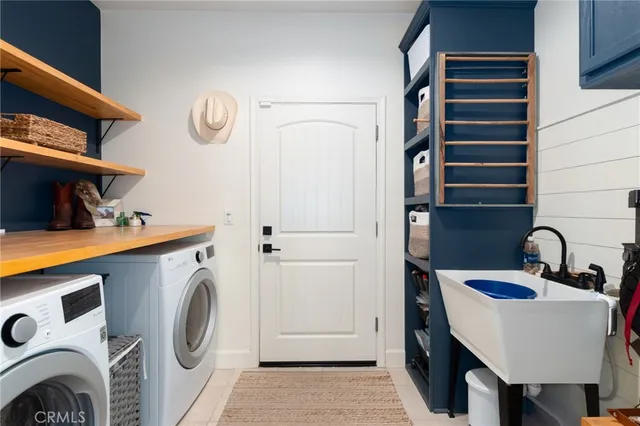 a view of a hallway a closet and a mirror
