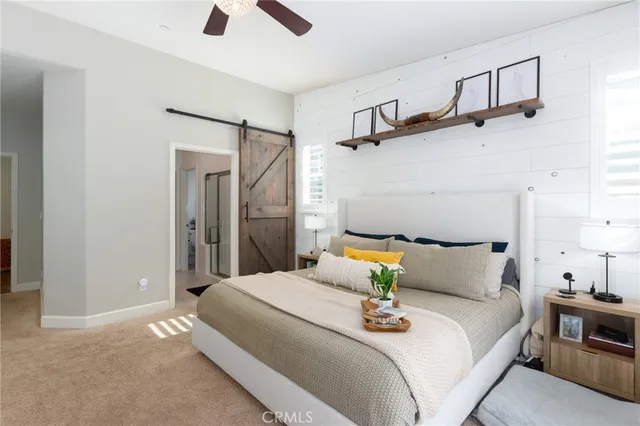a bathroom with a sink double vanity and a mirror