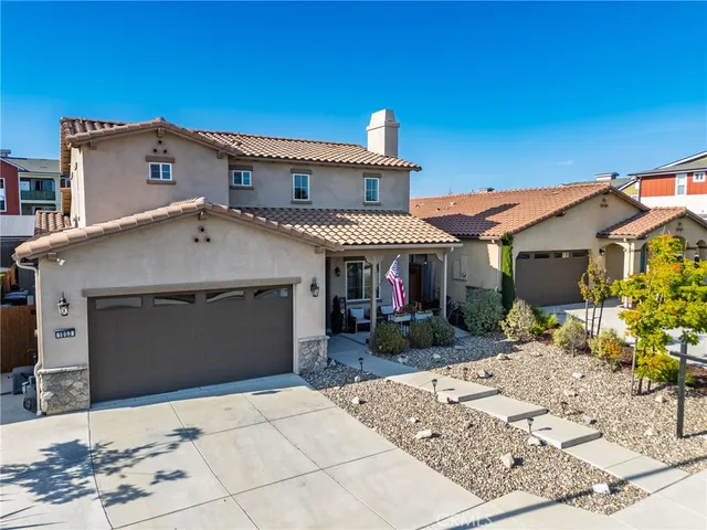 a view of a balcony with furniture