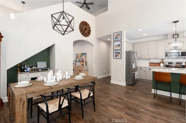 a kitchen with a table and chairs in it