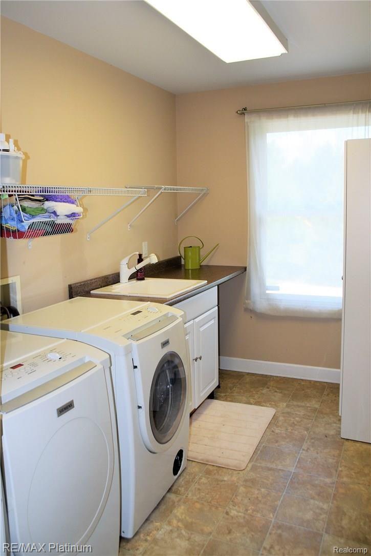 17033 Rosehill Road Pinckney, MI 48169 - Photo 11 of 17 upstairs laundry.jpg