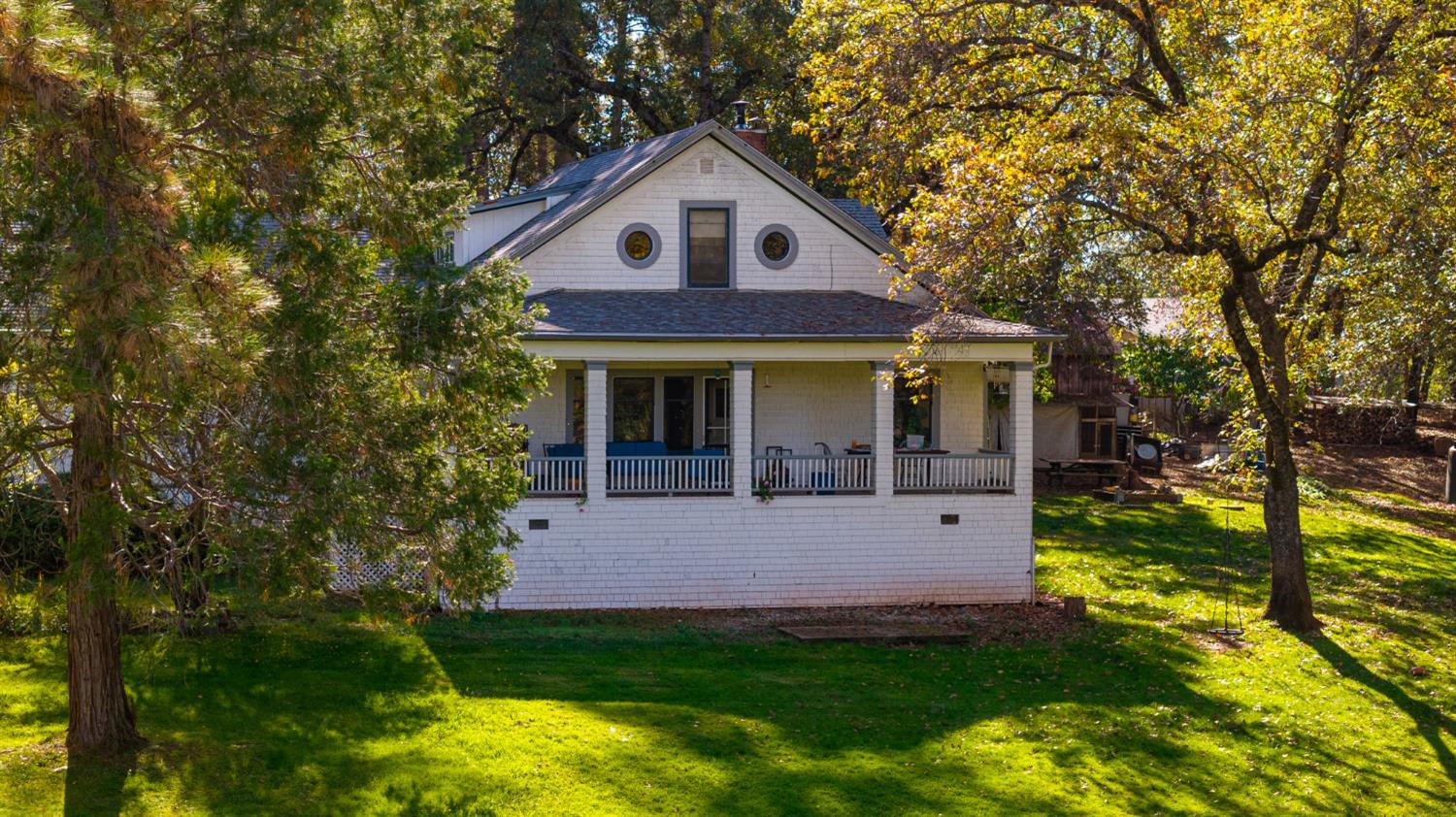 790 Pine Knoll Road Applegate, CA 95703 - Photo 34 of 81 a front view of a house with garden and porch
