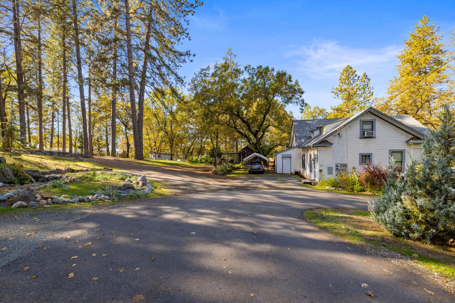 790 Pine Knoll Road Applegate, CA 95703 - Photo 67 of 81 a front view of a house with a yard and garage