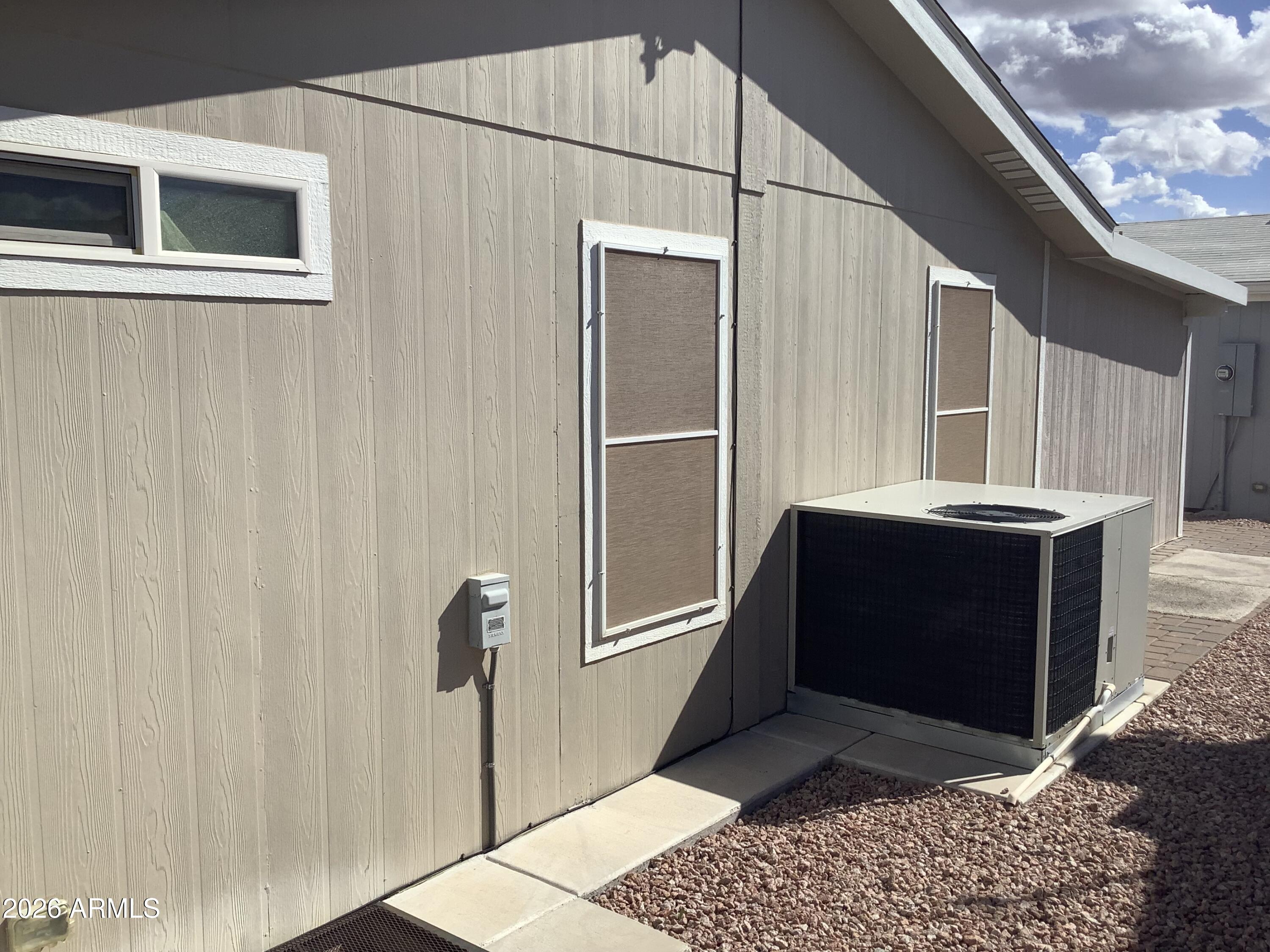 650 North Hawes Road, Unit 4007 Mesa, AZ 85207 - Photo 19 of 42 a front view of a house with a large window