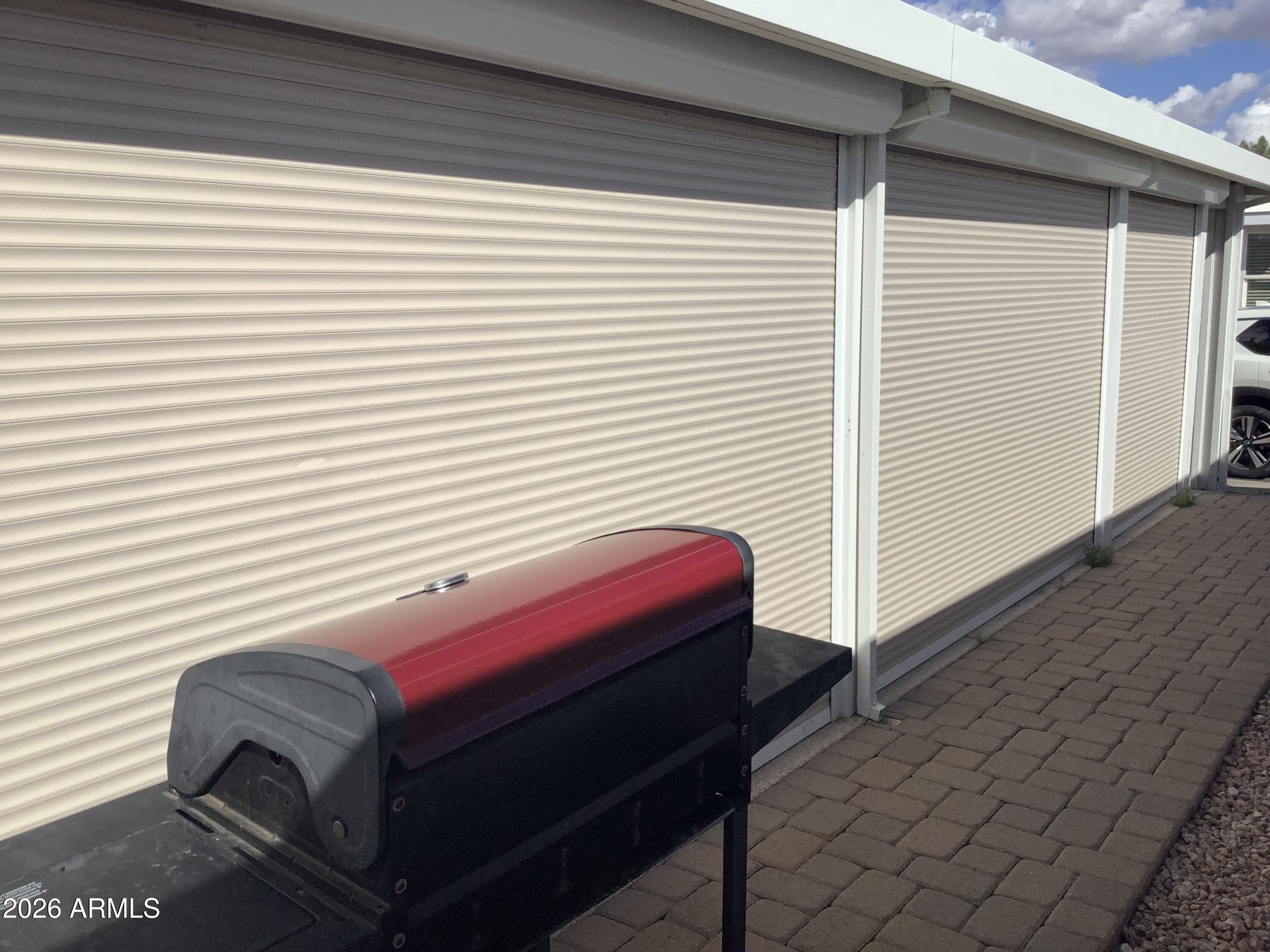 650 North Hawes Road, Unit 4007 Mesa, AZ 85207 - Photo 20 of 42 a view of a balcony with chair and table