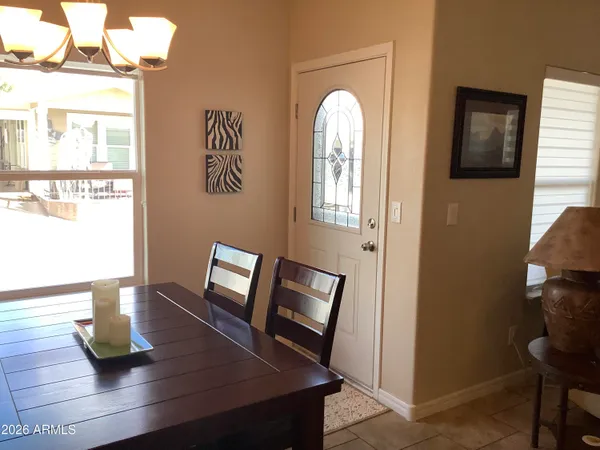 a view of living room with furniture and wooden floor