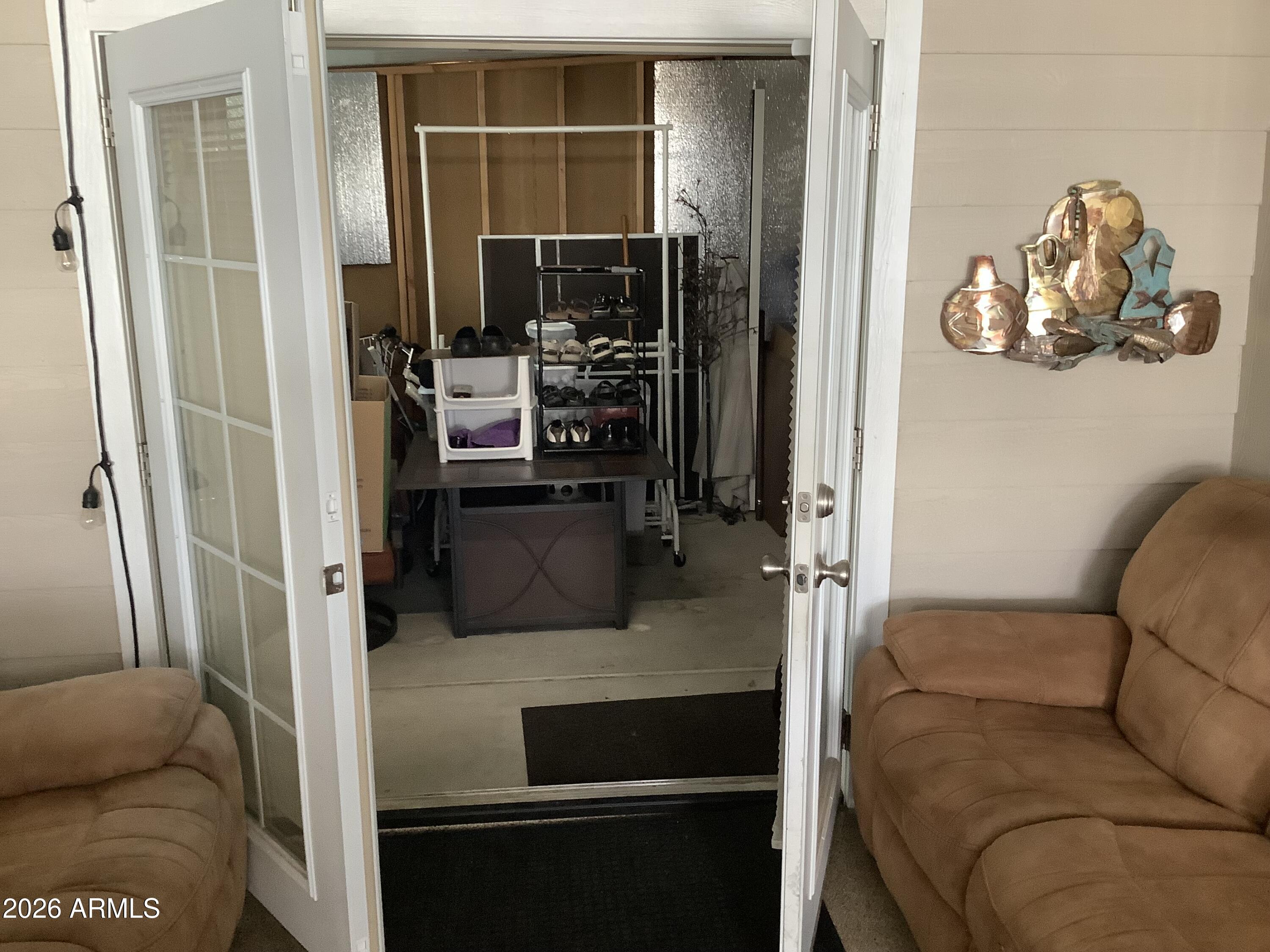 650 North Hawes Road, Unit 4007 Mesa, AZ 85207 - Photo 35 of 42 a kitchen with a refrigerator and a view of living room