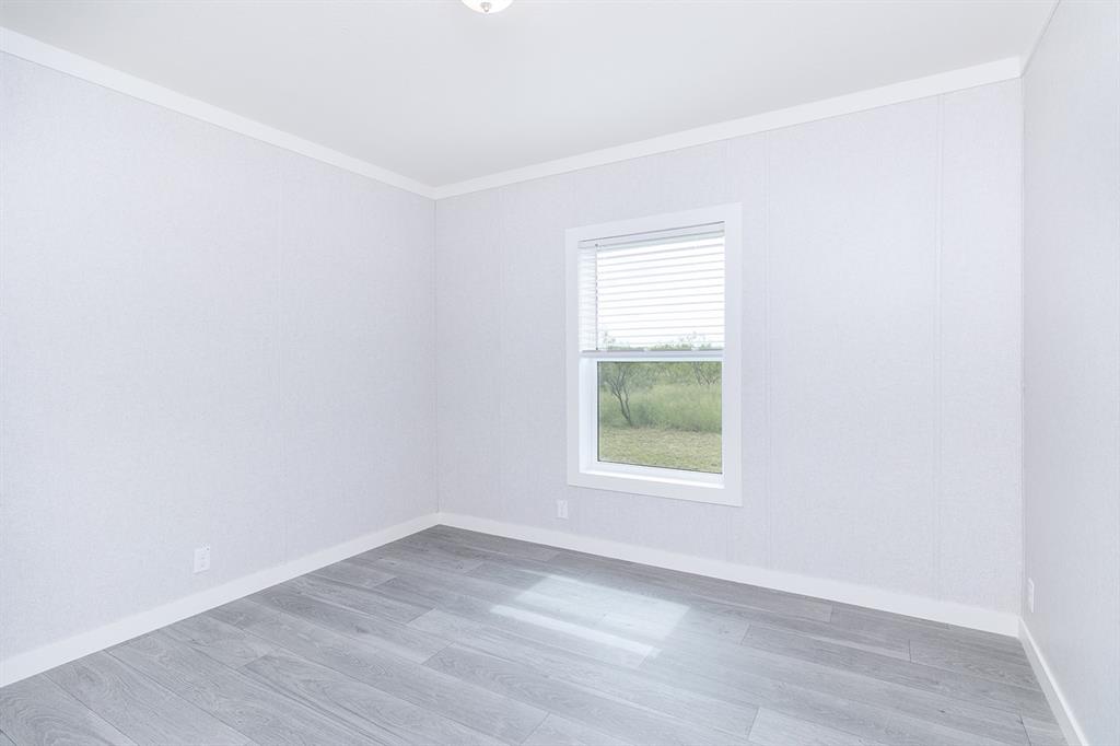 1895 County Road 472 Rochelle, TX 76872 - Photo 25 of 39 an empty room with a window