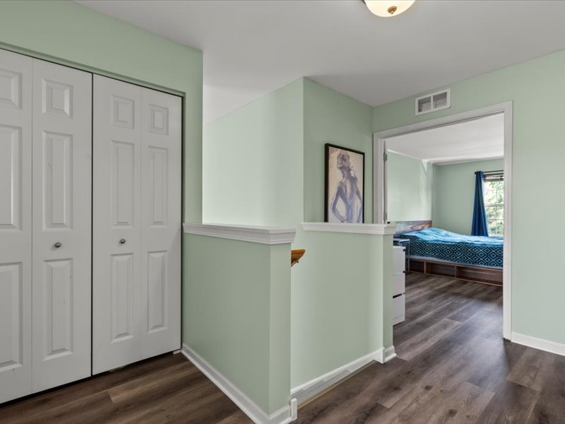 2147 Pembridge Lane Joliet, IL 60431 - Photo 15 of 34 a view of a room that has a bed and a mirror in it