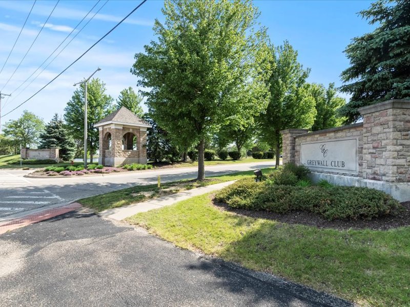2147 Pembridge Lane Joliet, IL 60431 - Photo 2 of 34 a view of fountain in front of house with trees