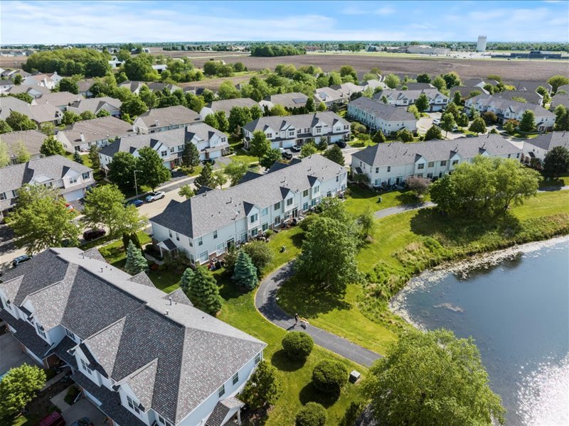 2147 Pembridge Lane Joliet, IL 60431 - Photo 27 of 34 an aerial view of residential houses with outdoor space