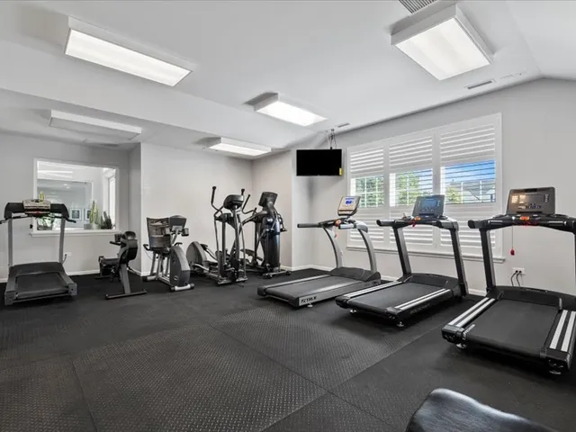 an aerial view of a house with a lake view