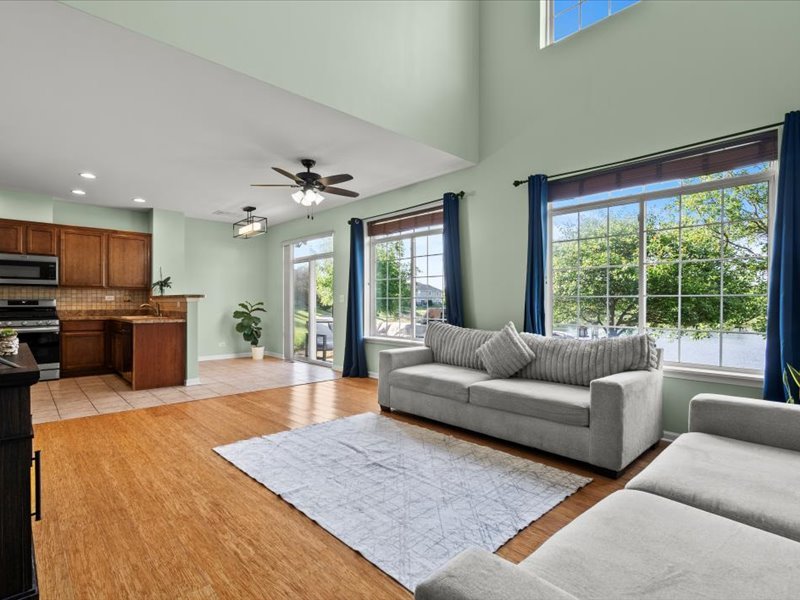2147 Pembridge Lane Joliet, IL 60431 - Photo 9 of 34 a living room with furniture and a large window