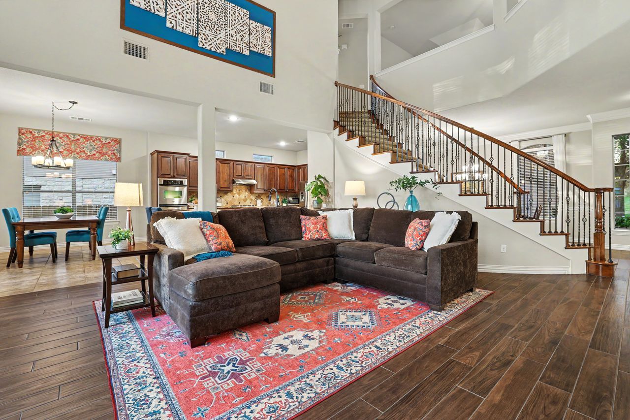2828 Collingwood Drive Round Rock, TX 78665 - Photo 11 of 38 a living room with furniture and wooden floor