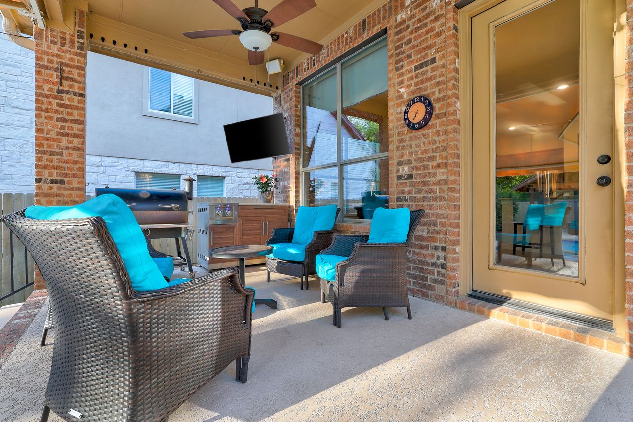 2828 Collingwood Drive Round Rock, TX 78665 - Photo 35 of 38 a outdoor space with patio the couches and a potted plant on a table