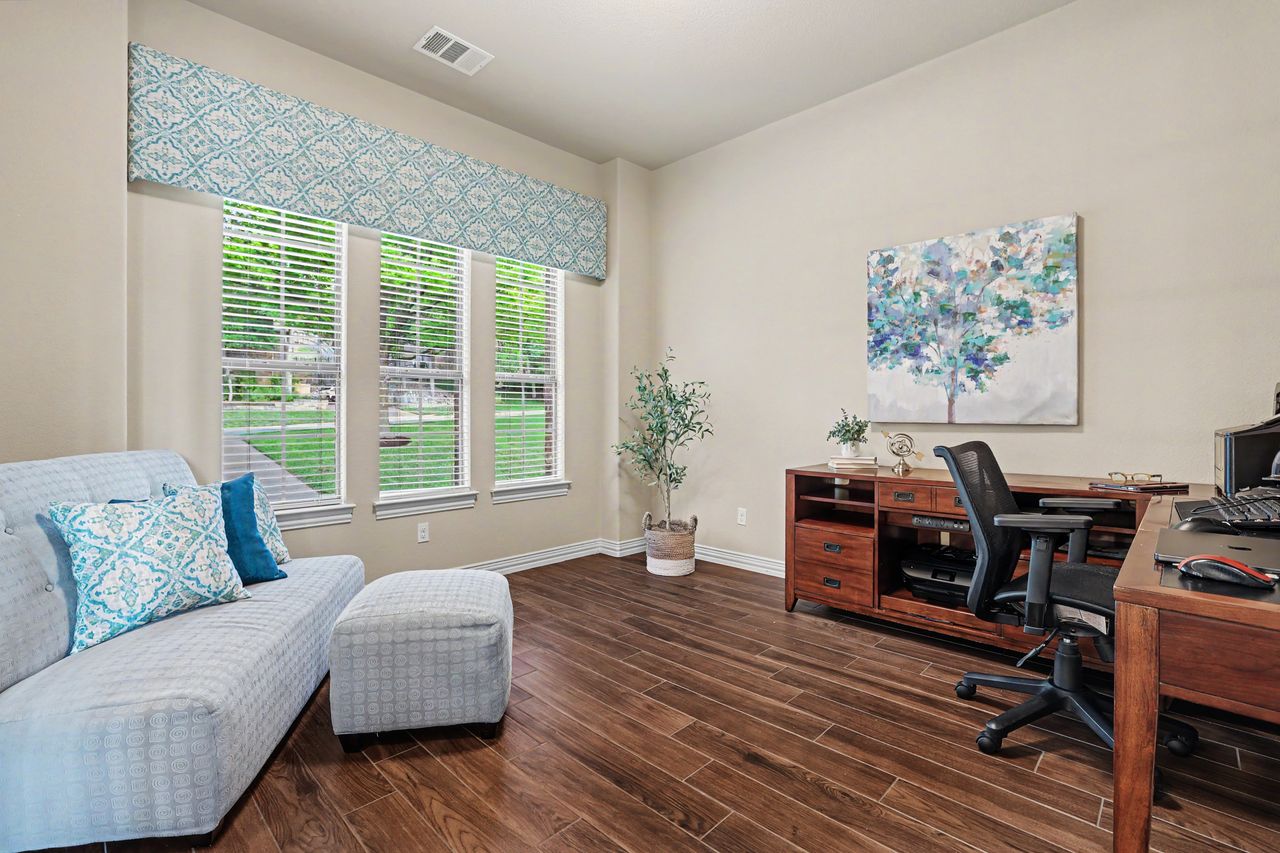 2828 Collingwood Drive Round Rock, TX 78665 - Photo 8 of 38 a living room with furniture and a window