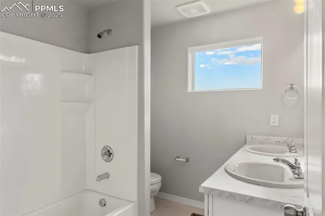 a bathroom with a sink and a tub