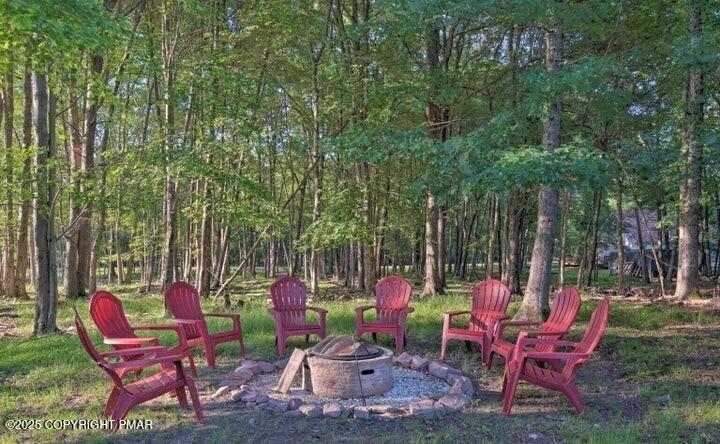 479 Mountain Road Albrightsville, PA 18210 - Photo 5 of 30 a view of a chairs and table in a backyard