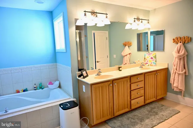 a kitchen with stainless steel appliances granite countertop a stove and a refrigerator